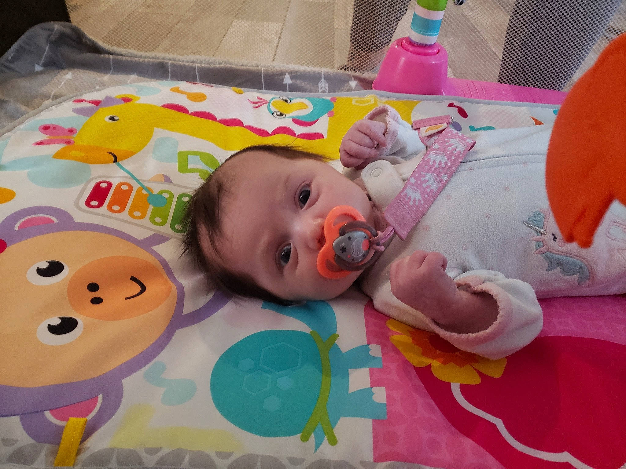 Mercedes is registered to the contest to win money with this photo: baby, baby_products, baby_toddler_clothing, baby_toys, cheek, child, comfort, eye, face, flooring, infant_bed, linens, person, pink, plastic_bag, product, room, skin, textile, toddler