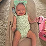 baby, infant, smiling, onesie, headband, baby_seat, carpet, toy, pink, mint_green, happy, child, indoor, comfort, sock, cute, soft, relaxed, portrait, young