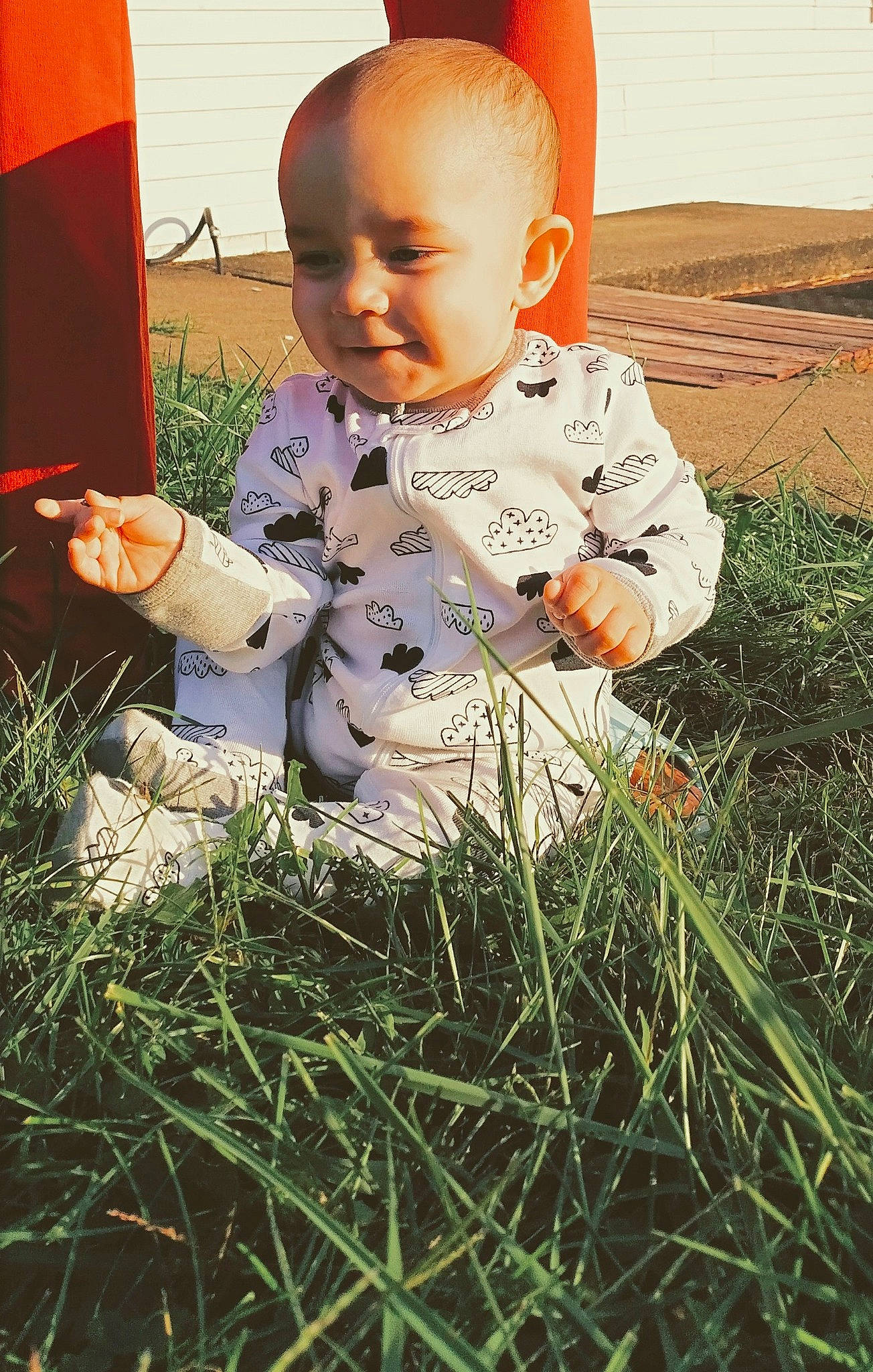 Jay joined the competition — help win amazing prizes! baby, baby_toddler_clothing, child, dress, face, fun, grass, grass_family, grassland, happy, head, lawn, pattern, people_in_nature, person, plant, play, prairie, sitting, sky