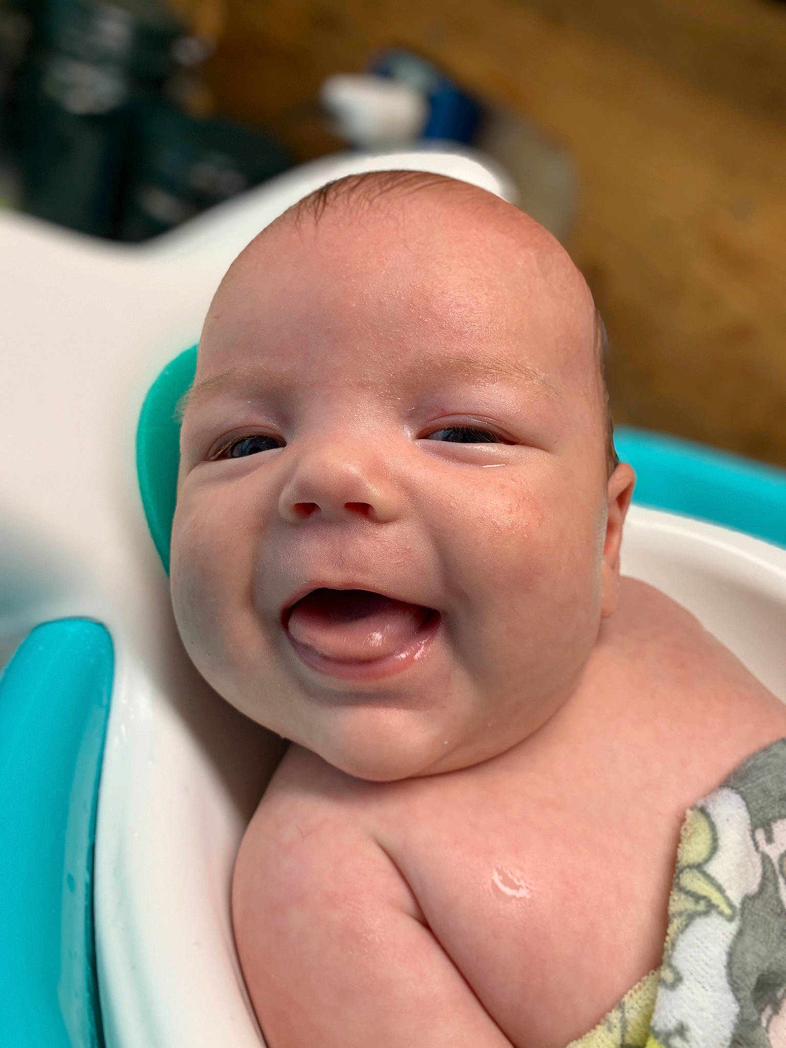 Caspen is registered to the contest to win money with this photo: baby, baby_laughing, bathing, cheek, child, event, eyelash, face, facial_expression, fun, gesture, happy, human_body, leisure, mouth, nose, person, skin, smile, toddler