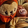 Ivyann is registered to the contest to win money with this photo: baby, pacifier, sleeping, teddy_bear, stuffed_animal, orange_hood, soft_toy, child, cute, cozy, bedtime, infant, plush, cuddle, comfort, fabric, pajamas, rest, sleepwear, closeup