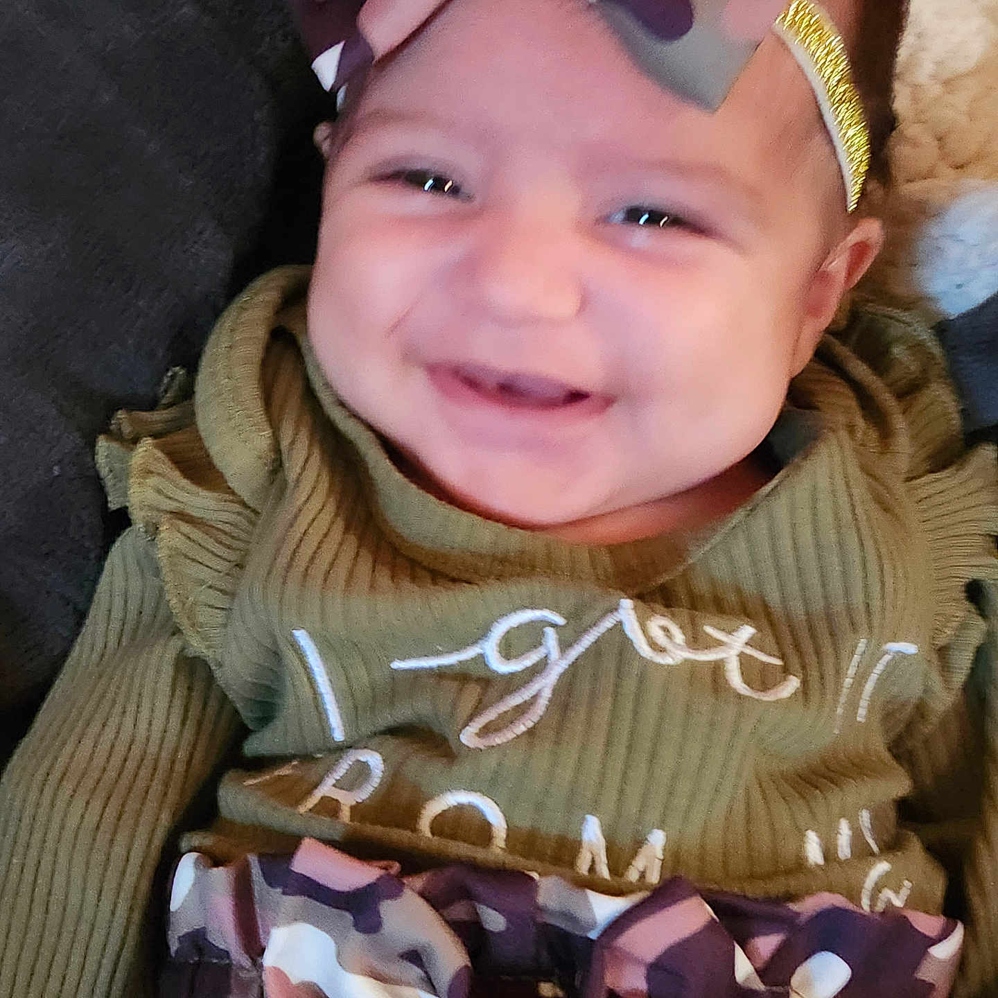Ivyann is registered to the contest to win money with this photo: apparel, baby, babyclothes, bow, child, closeup, clothing, cute, face, fashion, happy, headband, indoor, infant, person, portrait, smile, soft, warm, young