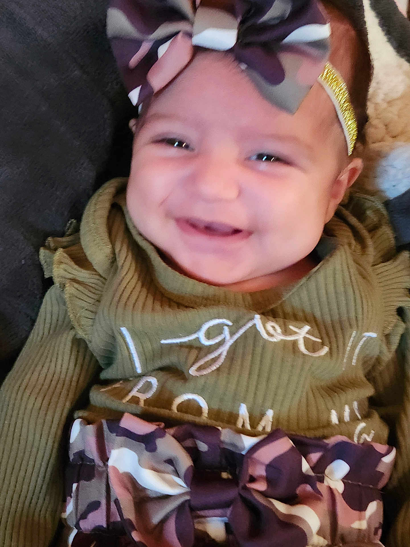 Ivyann is registered to the contest to win money with this photo: baby, smile, headband, bow, clothing, infant, happy, face, person, portrait, closeup, cute, child, apparel, fashion, young, babyclothes, soft, warm, indoor