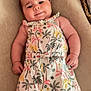 Jade participe au concours pour gagner de l'argent avec cette photo : baby, beige_background, child, chubby, comfortable, cute, face, hand, happy, indoors, infant, legs, lying_down, patterned_clothing, romper, short_hair, skin, smiling, soft_lighting, tropical_print