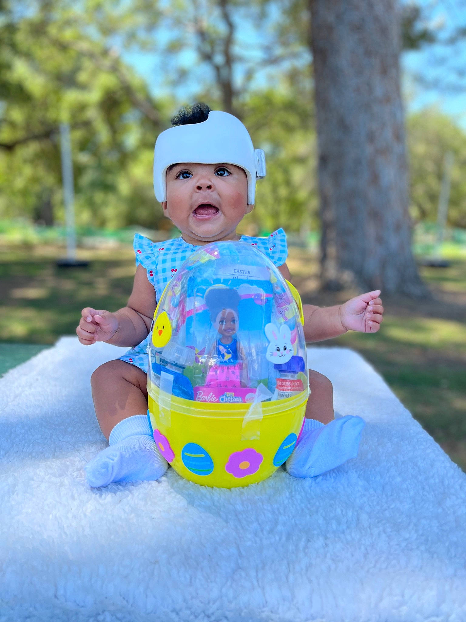 Tiana joined the competition — help win amazing prizes! baby, baby_toddler_clothing, cap, child, dress, electric_blue, face, fun, grass, happy, hat, headwear, leisure, people_in_nature, person, pink, plant, recreation, sitting, summer