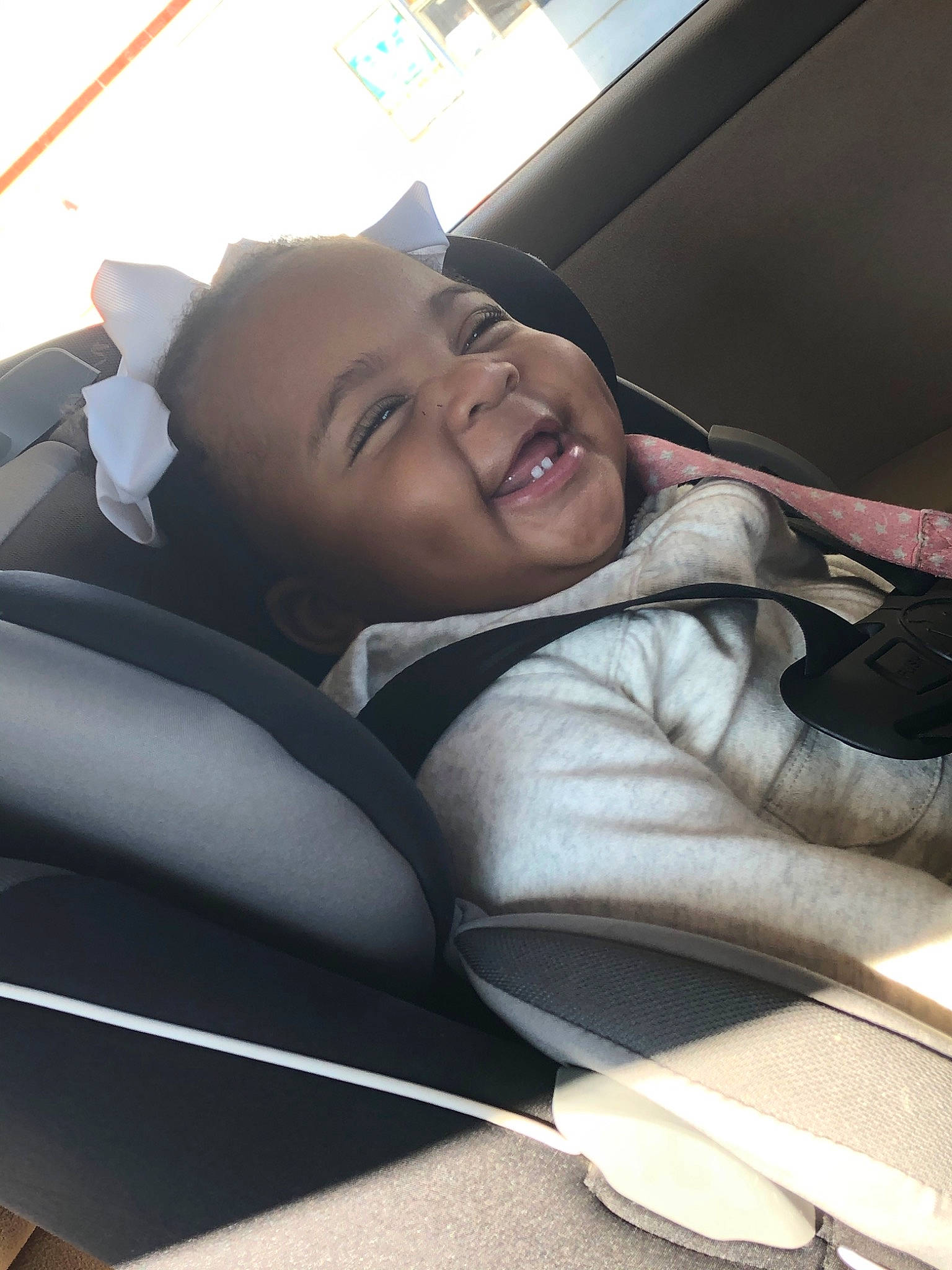 Maliah is registered to the contest to win money with this photo: auto_part, black_hair, car, car_seat, child, comfort, driving, family_car, head_restraint, luxury_vehicle, mouth, nap, person, seat_belt, sleep, smile, vacation