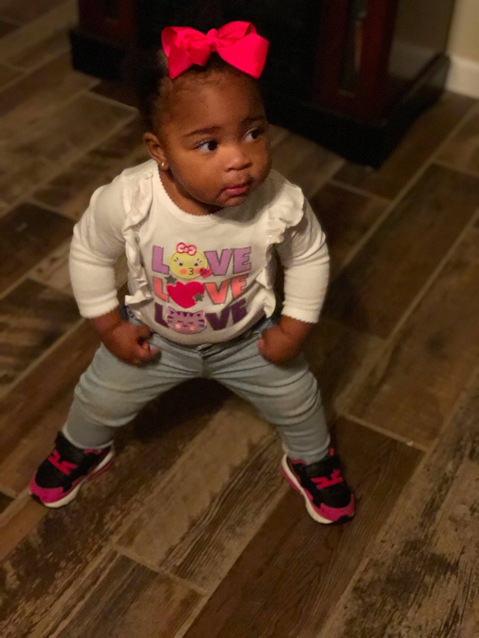 Maliah joined the competition — help win amazing prizes! baby, baby_toddler_clothing, child, child_model, costume, floor, flooring, footwear, hair_accessory, hardwood, headband, headgear, person, pink, play, shoe, sleeve, t_shirt, toddler, wood