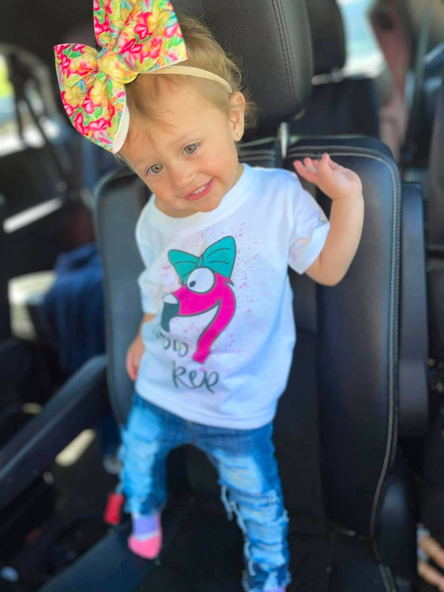 Camila is registered to the contest to win money with this photo: baby_toddler_clothing, cap, cool, costume_hat, face, facial_expression, fun, hairstyle, happy, hat, head, human, joy, mammal, person, pink, product, sleeve, smile, sun_hat