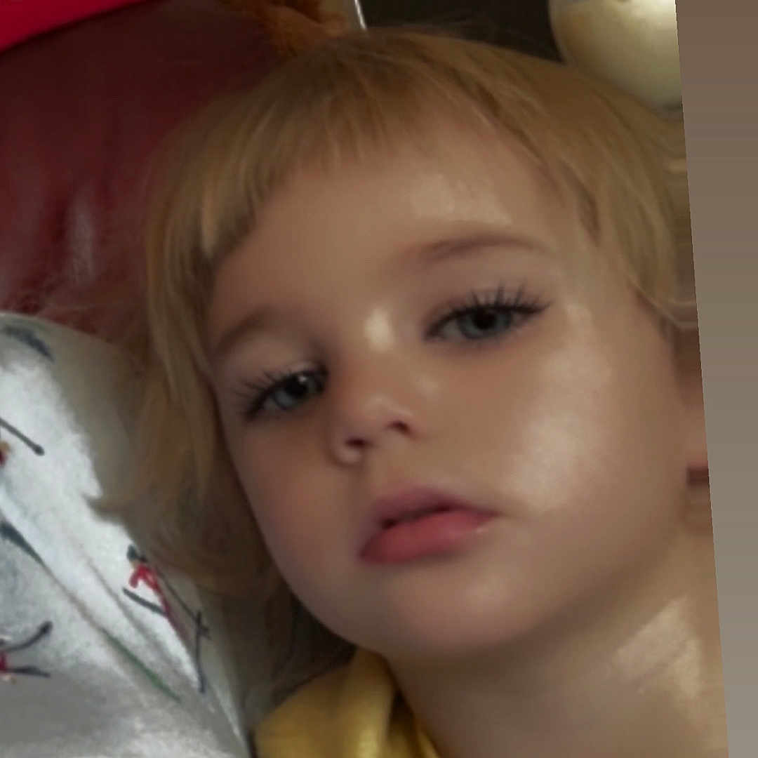 Violet is registered to the contest to win money with this photo: blonde, bodypart, child, computerhardware, cushion, electronics, face, female, finger, girl, hair, hand, hardware, head, homedecor, monitor, person, photography, portrait, screen