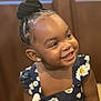 baby, babylaughing, blackhair, bodypart, braid, bunhairstyle, child, cornrows, face, female, girl, hair, happy, head, laughing, person, shoulder, smile