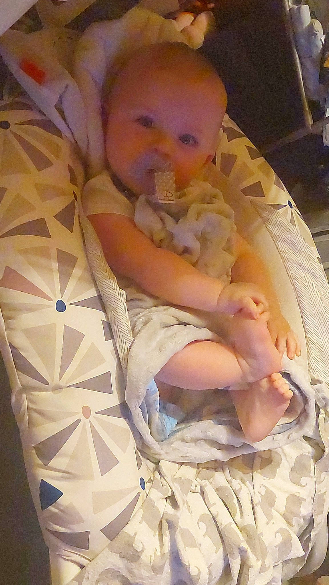 Brayden is registered to the contest to win money with this photo: abdomen, baby, baby_products, baby_safety, bedtime, chair, child, comfort, human_leg, infant_bed, linens, pattern, person, room, skin, sleep, smile, textile, thigh, thumb