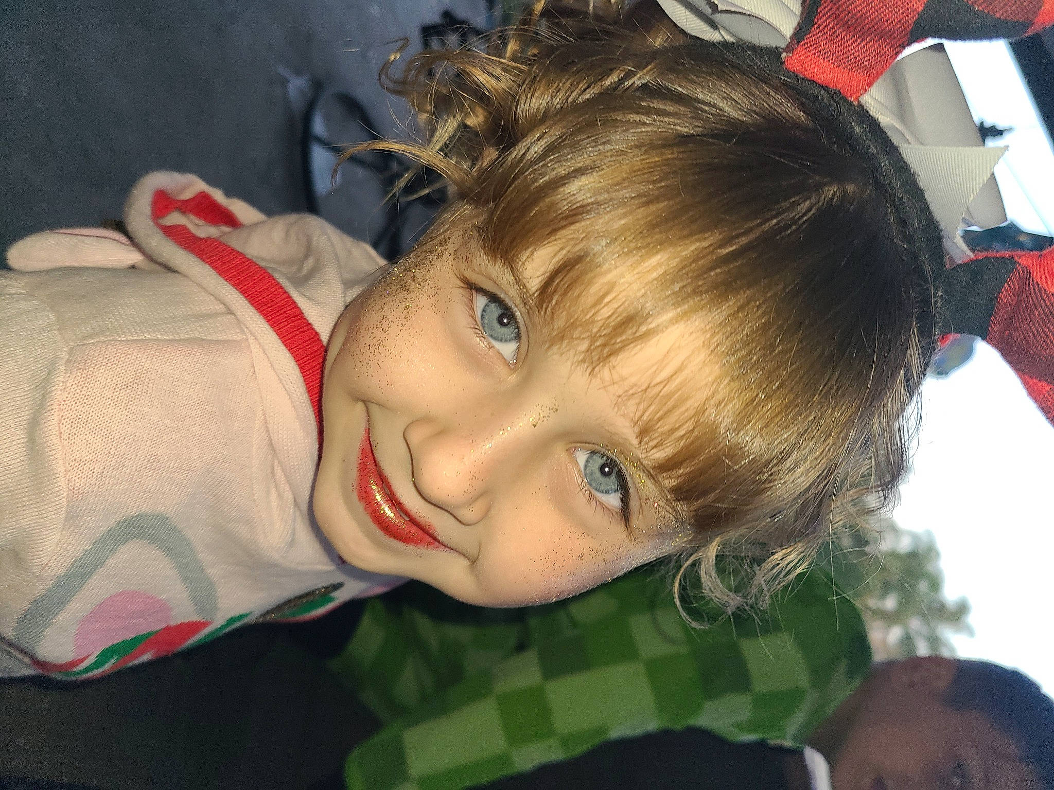 Kamryn joined the competition — help win amazing prizes! bangs, blond, brown_hair, cheek, child, ear, eyelash, feathered_hair, fun, grass, hair_coloring, happy, iris, joy, lip, nose, pattern, person, portrait_photography, sitting