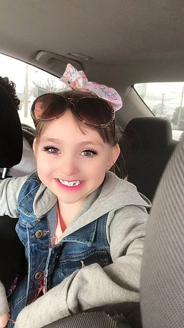 Aryanna joined the competition — help win amazing prizes! automotive_design, automotive_exterior, black_hair, car, car_seat, car_seat_cover, eyewear, goggles, happy, head, head_restraint, joy, lip, motor_vehicle, person, personal_luxury_car, smile, steering_part, steering_wheel, sunglasses