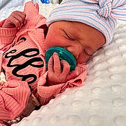 Sadie joined the competition — help win amazing prizes! newborn, baby, sleeping, pacifier, hat, pink_clothing, blanket, hospital_bed, medical_equipment, infant, cute, soft_texture, closeup, peaceful, resting, child, person, portrait, indoors, cozy