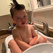 Zach joined the competition — help win amazing prizes! toddler, bath, bathtub, child, hair, spiky_hair, bubbles, kitchen, sink, faucet, water, skin, expression, funny, indoor, cabinet, countertop, person, playful, cute
