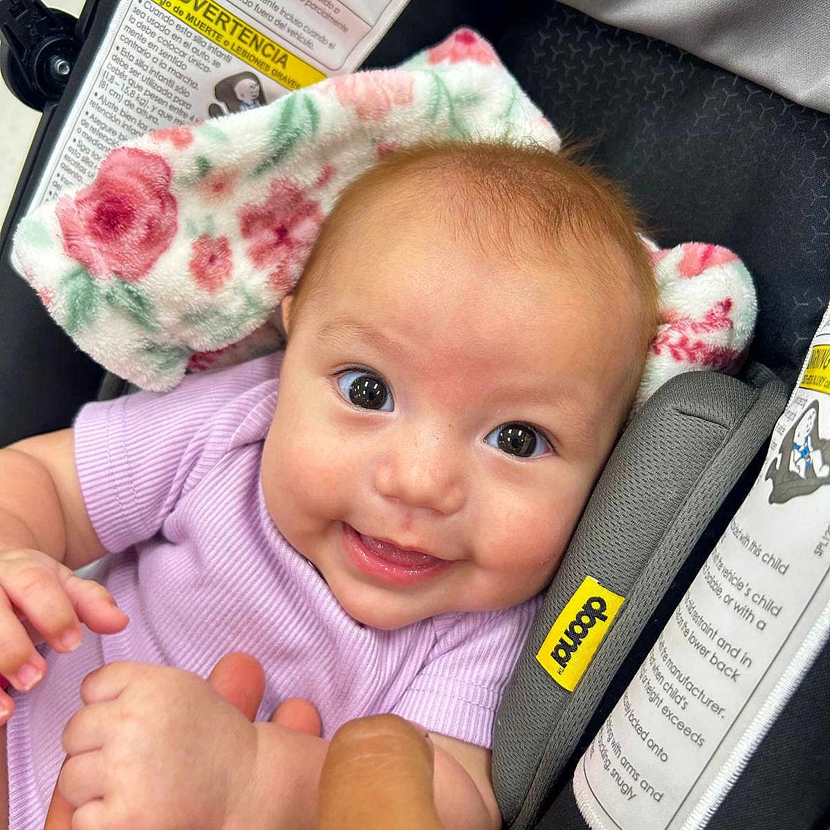 Arissa Victoria joined the competition — help win amazing prizes! baby, baby_girl, blanket, car_seat, child, closeup, clothing, cute, fabric, face, hand, happy, holding, indoors, infant, person, portrait, seatbelt, skin, smile