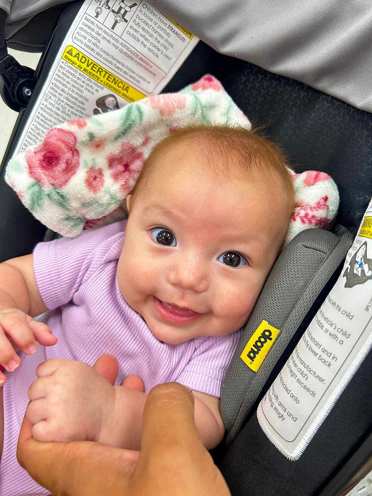 Arissa Victoria joined the competition — help win amazing prizes! baby, smile, car_seat, hand, infant, blanket, clothing, person, portrait, cute, child, holding, happy, skin, face, baby_girl, indoors, closeup, seatbelt, fabric