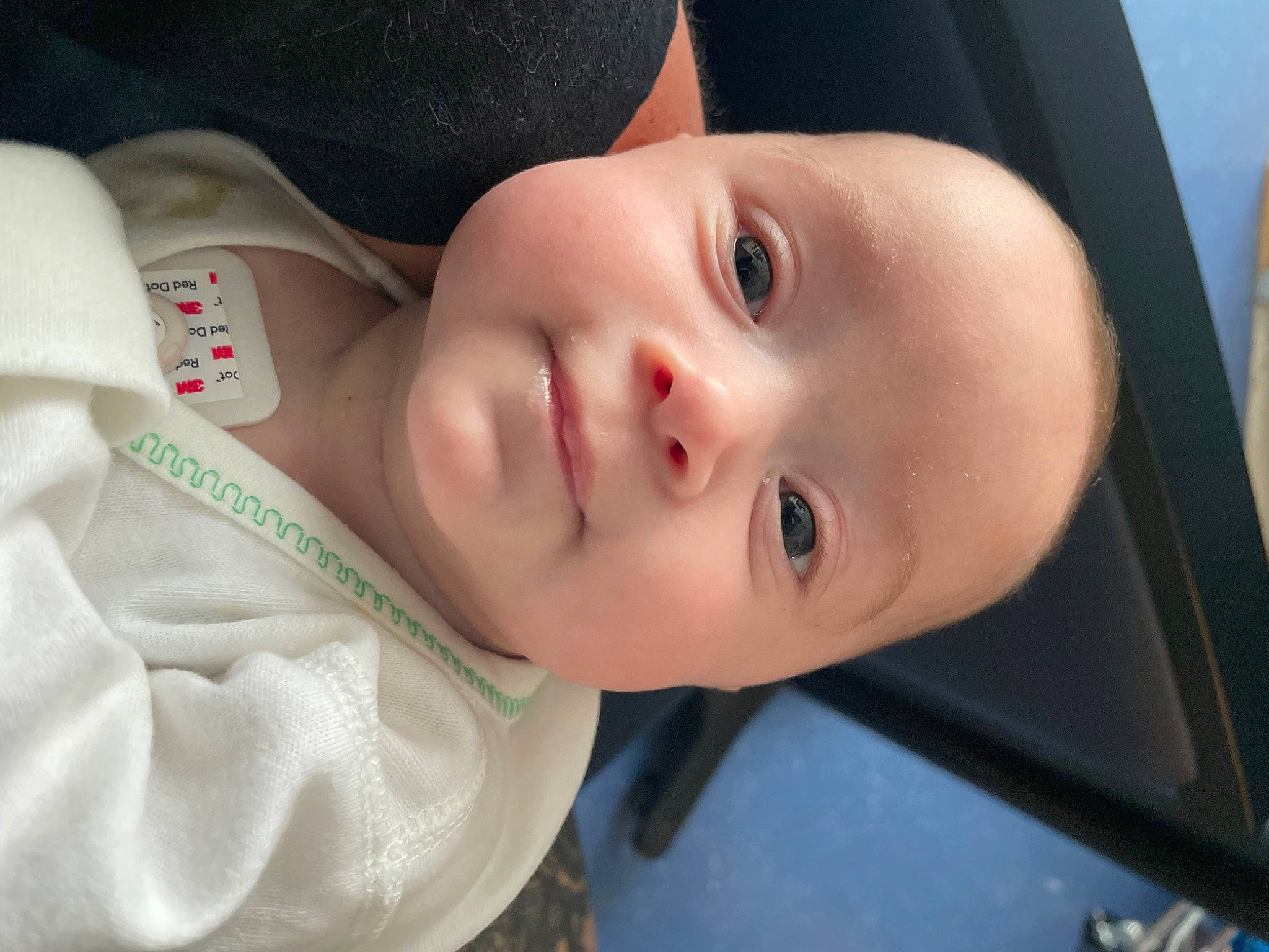 Quinn is registered to the contest to win money with this photo: baby, baby_toddler_clothing, cheek, child, chin, eyelash, flash_photography, hat, iris, lip, nose, person, portrait_photography, skin, sleeve, smile, toddler, tree, window, wood