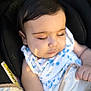 Nazli joined the competition — help win amazing prizes! baby, infant, sleeping, face, eyes_closed, blanket, clothing, blue_flower_pattern, hand, arm, car_seat, cushion, skin, peaceful, child, young, portrait, indoors, soft_light, closeup