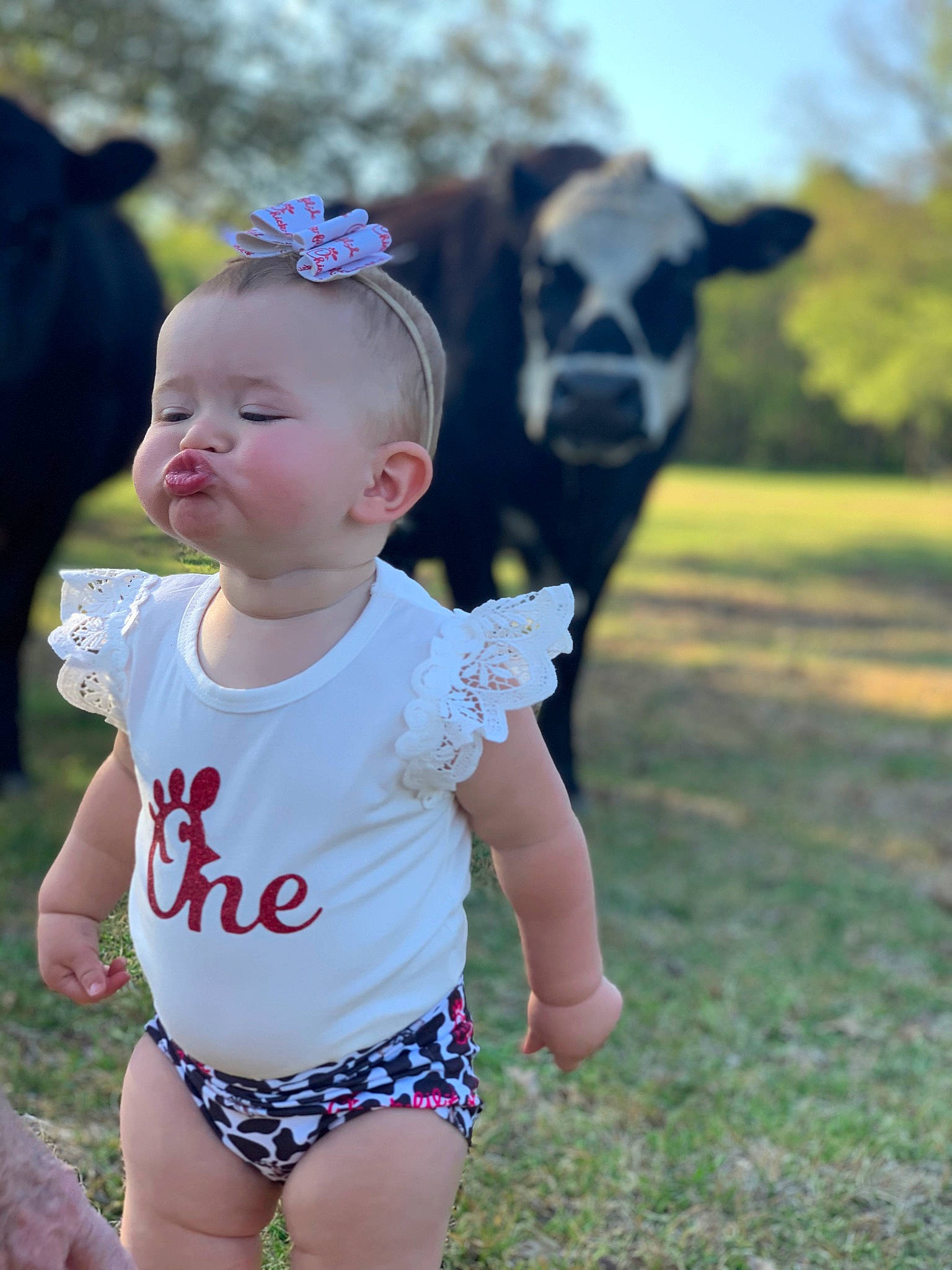 Lakyn is registered to the contest to win money with this photo: baby, baby_toddler_clothing, child, fun, grass, happy, iris, leisure, neck, people, people_in_nature, person, pink, plant, skin, sky, sleeve, standing, summer, toddler