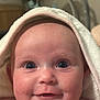 Layla joined the competition — help win amazing prizes! baby, infant, smile, face, eyes, towel, skin, cheeks, cute, child, expression, portrait, indoor, newborn, head, soft, happy, closeup, warm, person