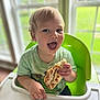 Spencer joined the competition — help win amazing prizes! toddler, child, high_chair, pizza, food, smiling, happy, indoor, window, green_chair, blonde_hair, curly_hair, eating, mouth_open, short_sleeve_shirt, light, natural_light, closeup, cute, mealtime