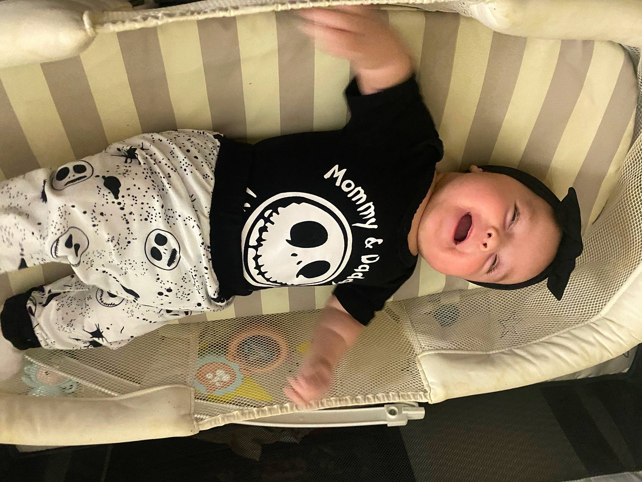 Melanie is registered to the contest to win money with this photo: baby, baby_products, baby_toddler_clothing, child, comfort, cool, couch, elbow, happy, human_body, linens, pattern, person, product, room, sitting, sleeve, t_shirt, textile, thigh
