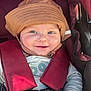 Grégory a rejoint le concours — aidez-le/la à gagner de superbes lots ! baby, child, hat, sunhat, car_seat, smile, happy, face, infant, clothing, seatbelt, straps, hand, closeup, portrait, cute, young_child, safety, daylight, person