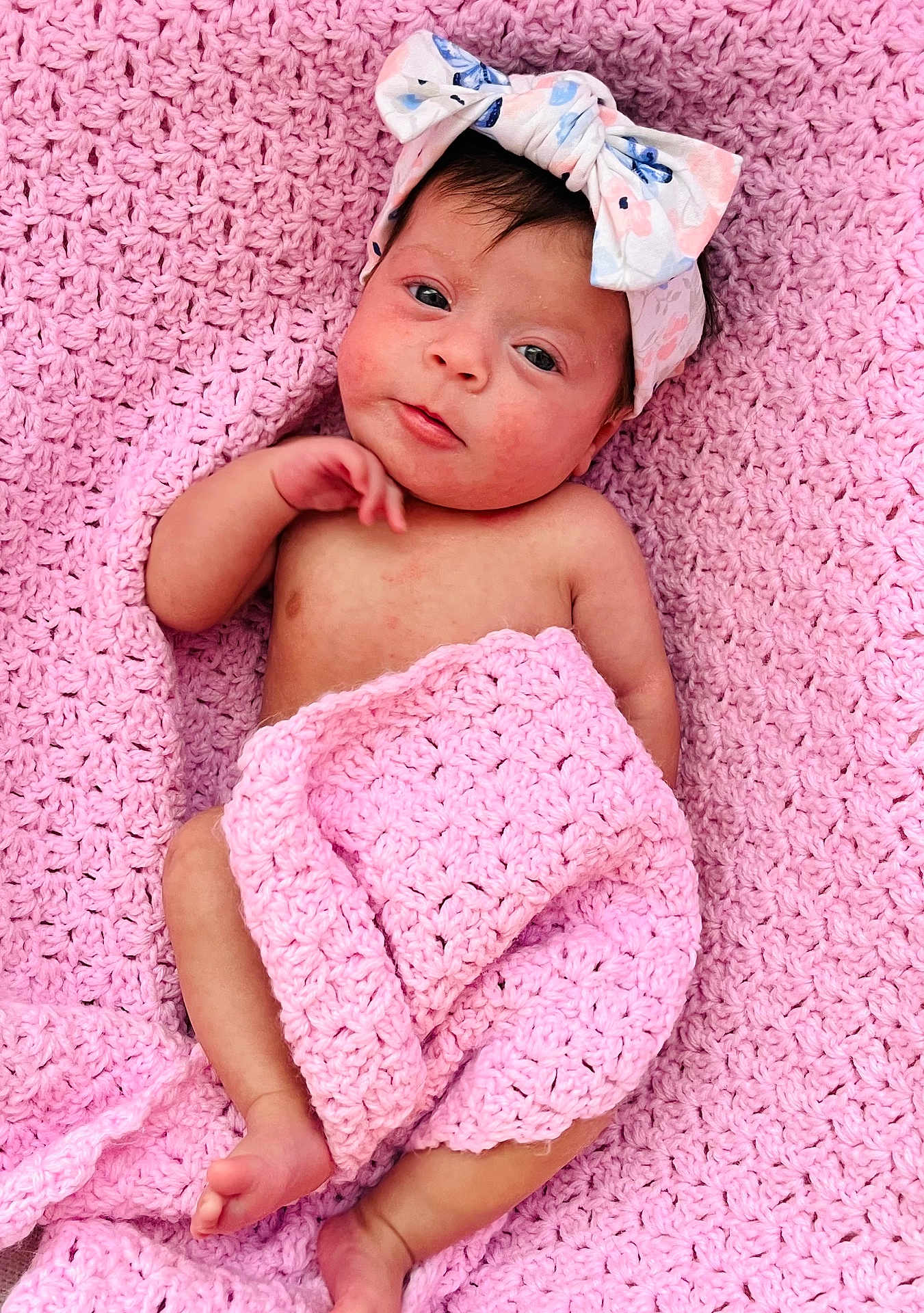 Eliana joined the competition — help win amazing prizes! baby, infant, pink_blanket, headband, bow, knitted, soft_texture, cute, newborn, lying_down, skin, portrait, child, small_feet, hand, face, expression, indoors, cozy, comfortable