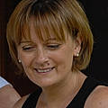 Corinne E.