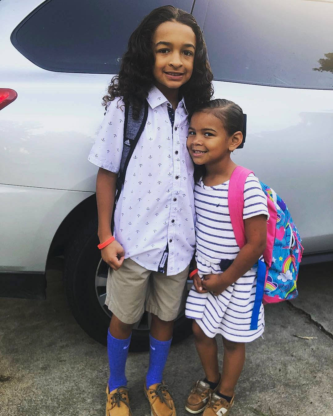 Sammy is registered to the contest to win money with this photo: automotive_design, black_hair, car, child, crossover_suv, daughter, family_car, footwear, happy, interaction, joy, luxury_vehicle, mid_size_car, people, person, photography, smile, sport_utility_vehicle, toddler, vacation