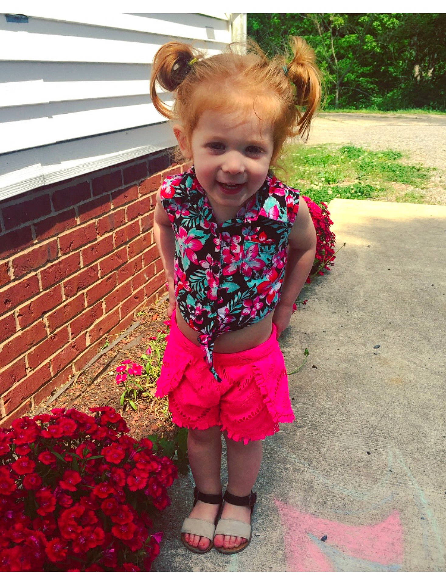 Taytum is registered to the contest to win money with this photo: child, day, dress, flower, fun, girl, happiness, magenta, pattern, person, pink, plant, play, red, skin, smile, spring, standing, summer, textile