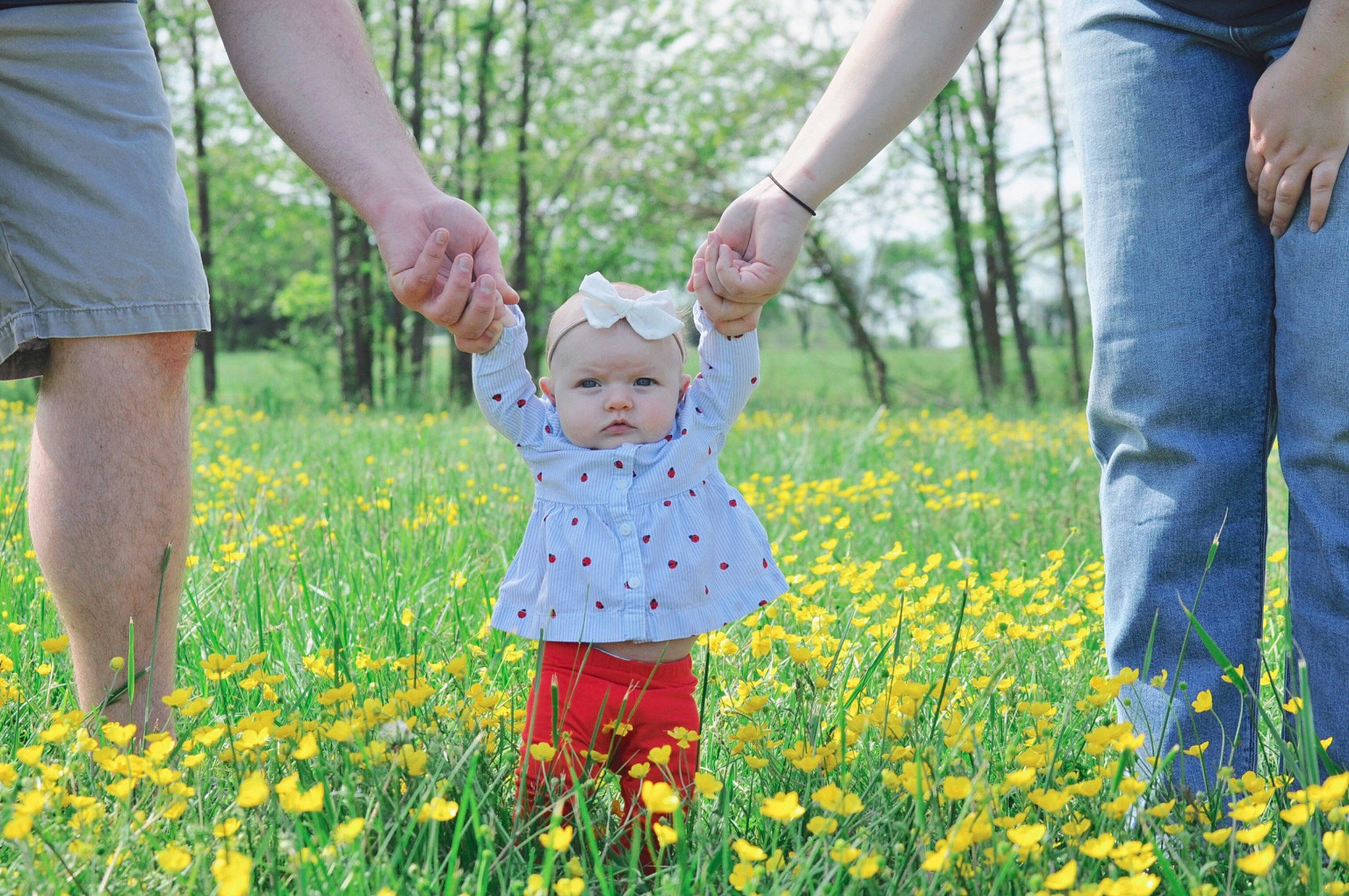 Lucie is registered to the contest to win money with this photo: child, fun, gesture, grass, grass_family, hand, happy, headwear, holding_hands, interaction, meadow, people, people_in_nature, person, photograph, plant, playing_with_kids, spring, summer, toddler