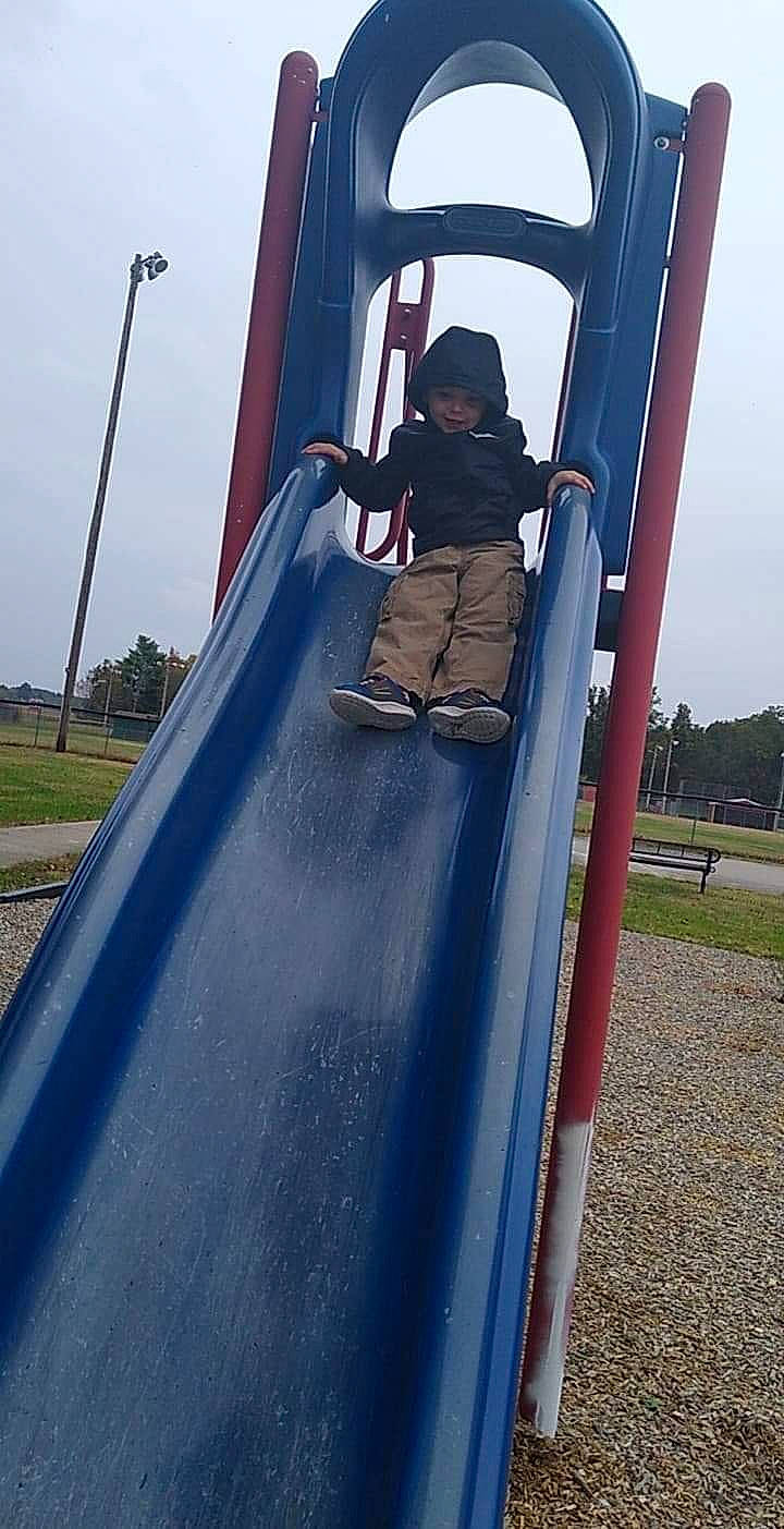 Jace joined the competition — help win amazing prizes! chute, city, fun, headwear, human_settlement, joy, leisure, outdoor_play_equipment, person, playground, playground_slide, public_space, recreation