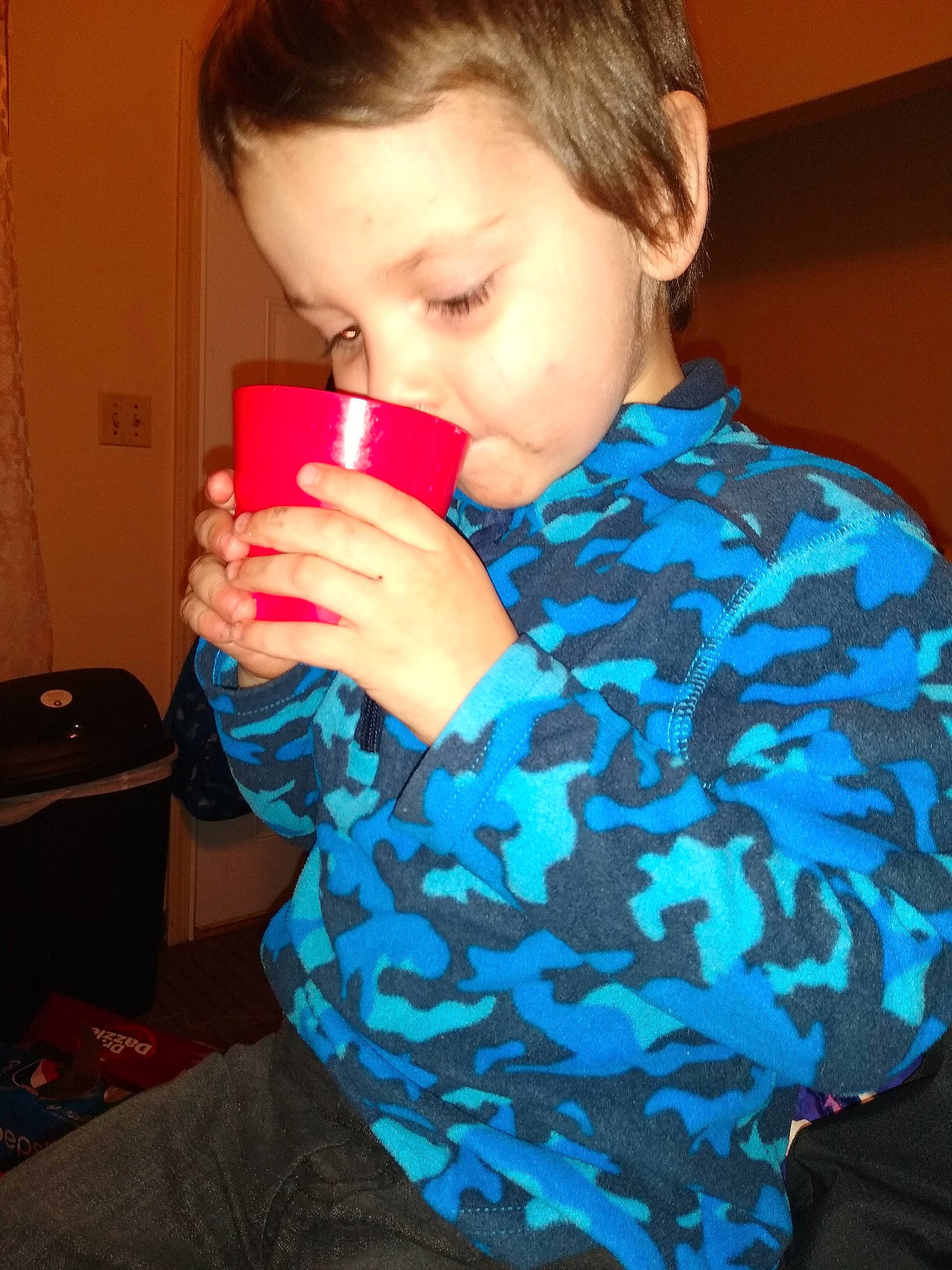 Jace is registered to the contest to win money with this photo: cheek, child, drinking, finger, neck, nose, person, play, toddler