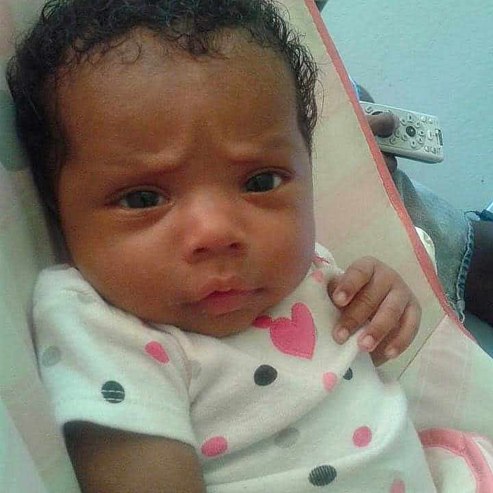 Amaralee joined the competition — help win amazing prizes! baby, child, clothing, curly_hair, cushion, cute, expression, face, hand, head, heart, indoor, infant, looking, person, polka_dot, portrait, resting, skin, young_child