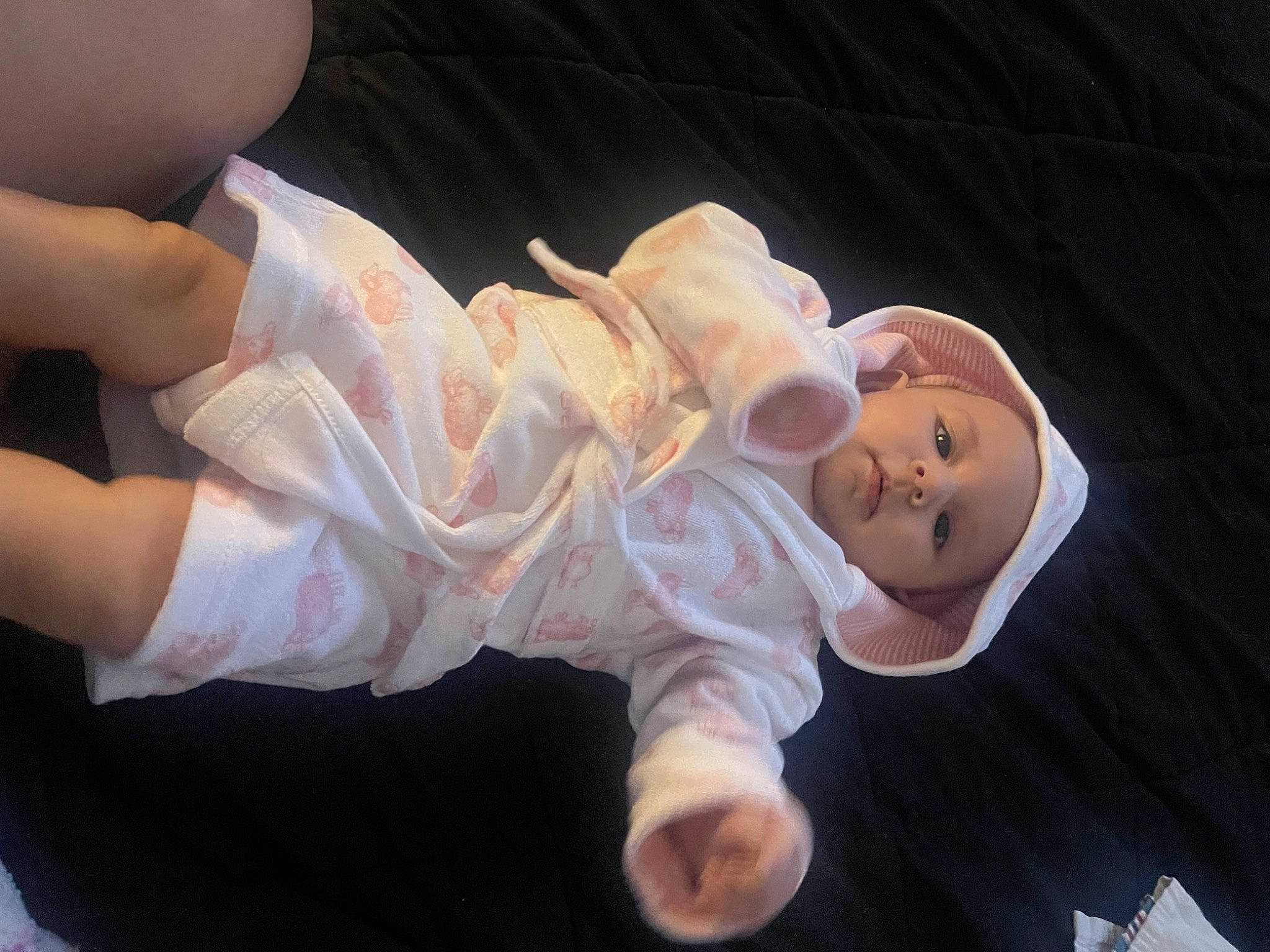 Sadie is registered to the contest to win money with this photo: baby, baby_products, baby_toddler_clothing, barefoot, comfort, elbow, event, finger, foot, gesture, hat, headwear, human_leg, knee, nail, person, sitting, sleeve, thigh, thumb