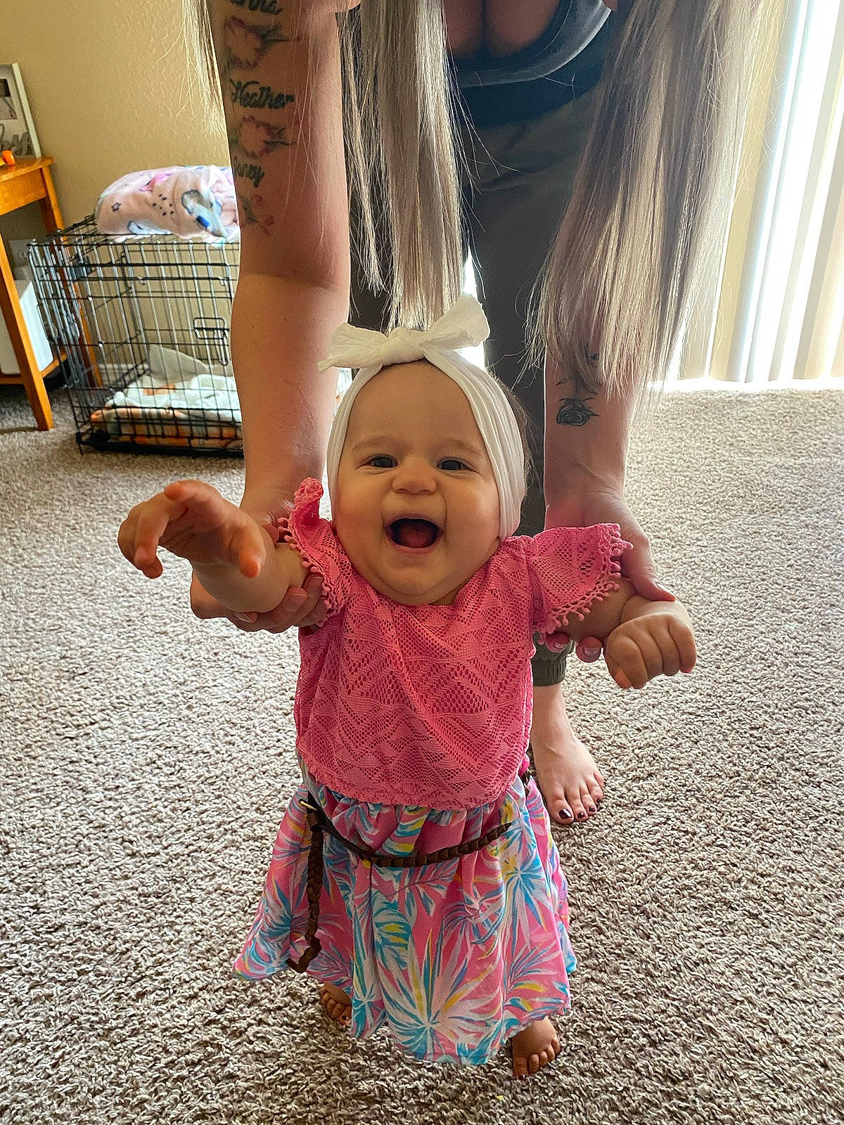 Alena joined the competition — help win amazing prizes! arm, baby, baby_toddler_clothing, chair, child, dress, eye, finger, gesture, happy, hat, joint, person, pink, skin, sleeve, smile, standing, thumb, toddler