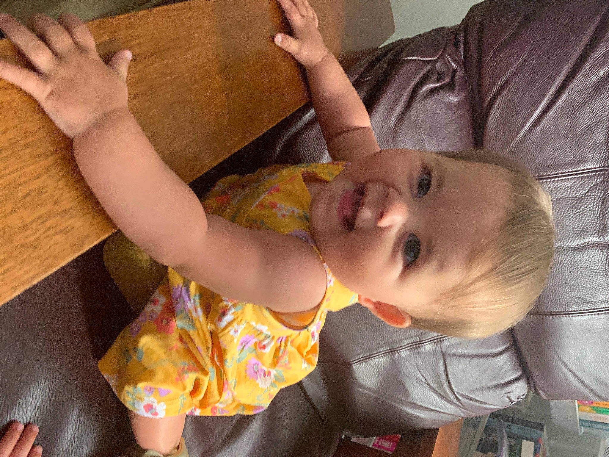 Genesis joined the competition — help win amazing prizes! baby, baby_toddler_clothing, chair, cheek, child, eye, facial_expression, fun, hand, happy, mammal, mouth, person, product, room, sitting, skin, smile, table, toddler