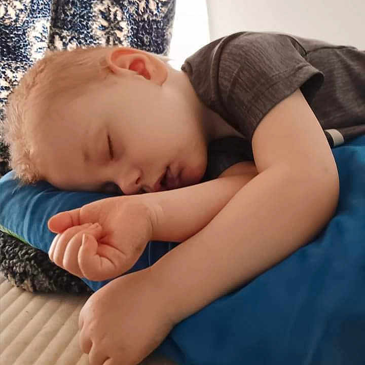 Tobias Dale is registered to the contest to win money with this photo: arms, bedroom, child, clothing, comfort, curtains, face, hair, indoor, nap, peaceful, pillow, quiet, relaxed, rest, short_sleeve, skin, sleeping, toddler, young_child