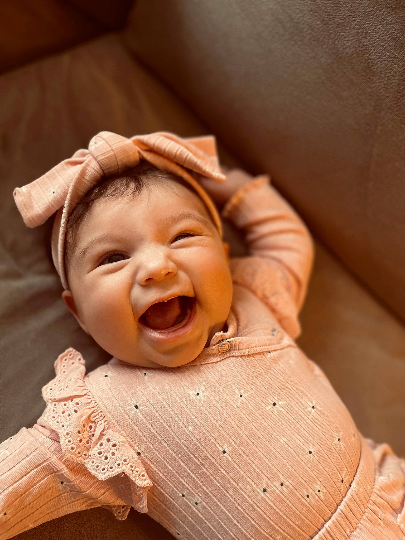 Everlee is registered to the contest to win money with this photo: baby, baby_laughing, baby_toddler_clothing, cheek, child, collar, comfort, eye, fun, happy, headwear, iris, laugh, lip, nose, person, sitting, sleeve, smile, toddler