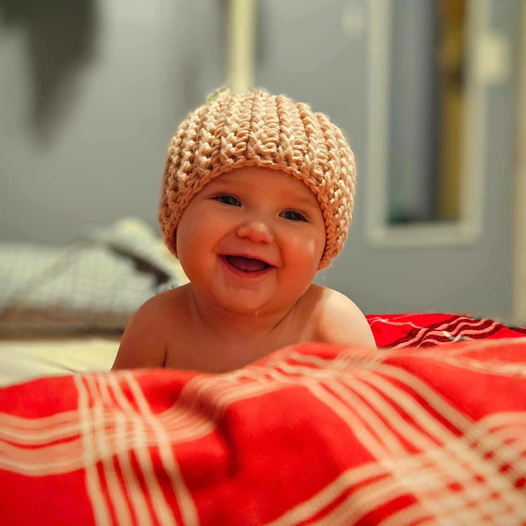 Amy-Lynn joined the competition — help win amazing prizes! baby, babylaughing, beanie, blanket, bonnet, cap, clothing, face, glove, happy, hat, head, laughing, newborn, person, photography, portrait, quilt, smile, towel