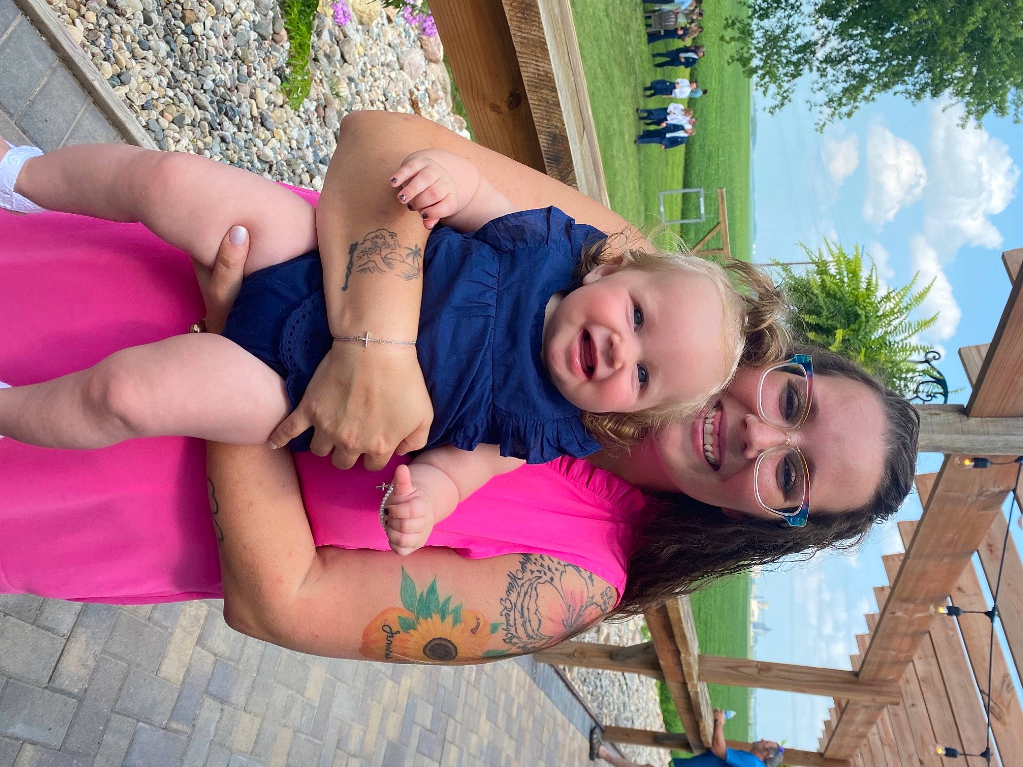 Jemma is registered to the contest to win money with this photo: arm, cool, eye, fun, grass, happy, human, human_leg, joy, leisure, mouth, people_in_nature, person, pink, plant, shorts, skin, sky, smile, thigh