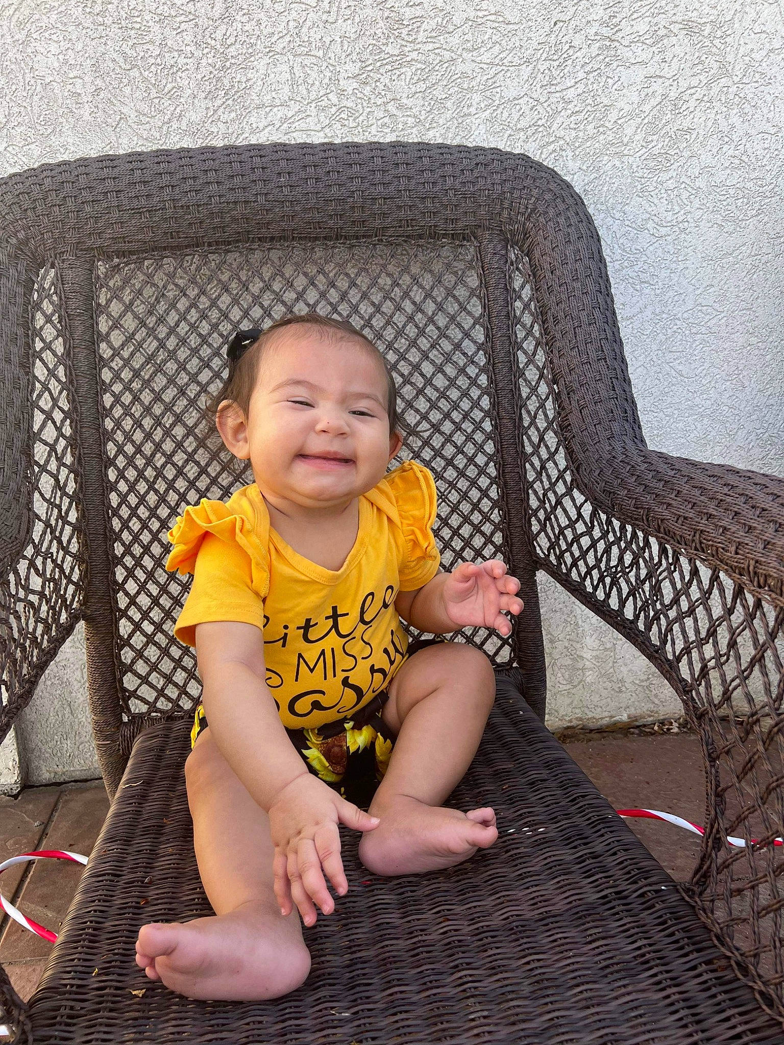 Evangeline Calderon joined the competition — help win amazing prizes! baby, baby_products, baby_toddler_clothing, chair, cheek, child, comfort, flooring, foot, fun, grass, happy, human_leg, joy, leisure, pattern, person, sitting, skin, tints_and_shades