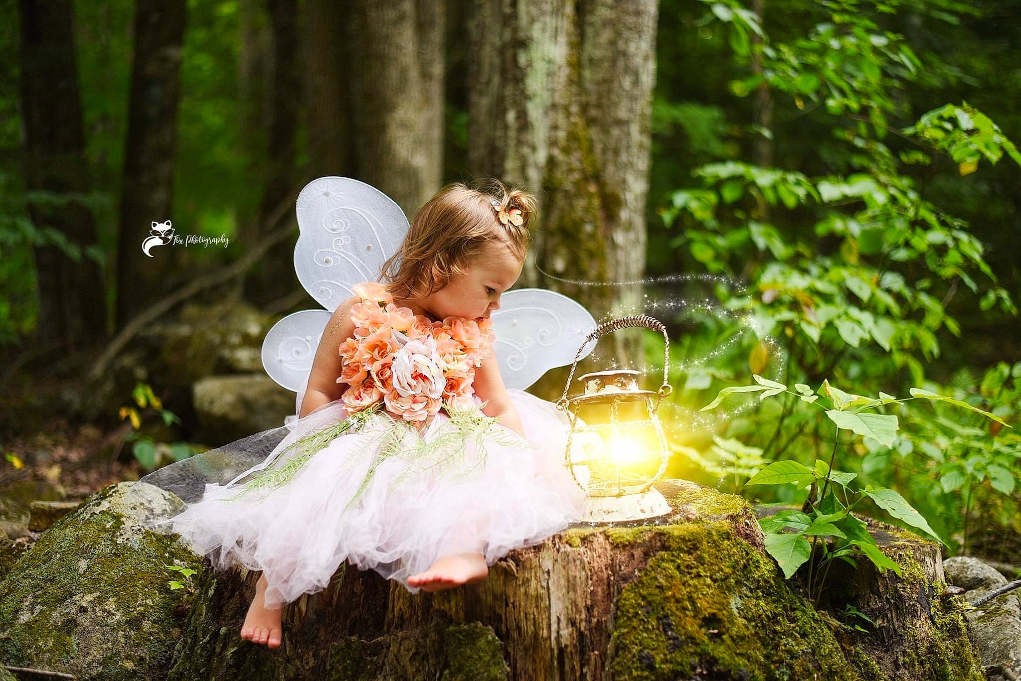 Emily-elizabeth joined the competition — help win amazing prizes! child, dress, flash_photography, forest, grass, happy, headpiece, jungle, leisure, natural_landscape, nature, people_in_nature, person, plant, recreation, sitting, sunlight, toddler, tree, trunk
