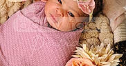 Nielle joined the competition — help win amazing prizes! newborn, baby, infant, child, portrait, sleeping, bundled, pink_blanket, floral_headband, flowers, bouquet, cozy, basket, text_overlay, watermark, close_up, indoors, soft_lighting, adorable, photography