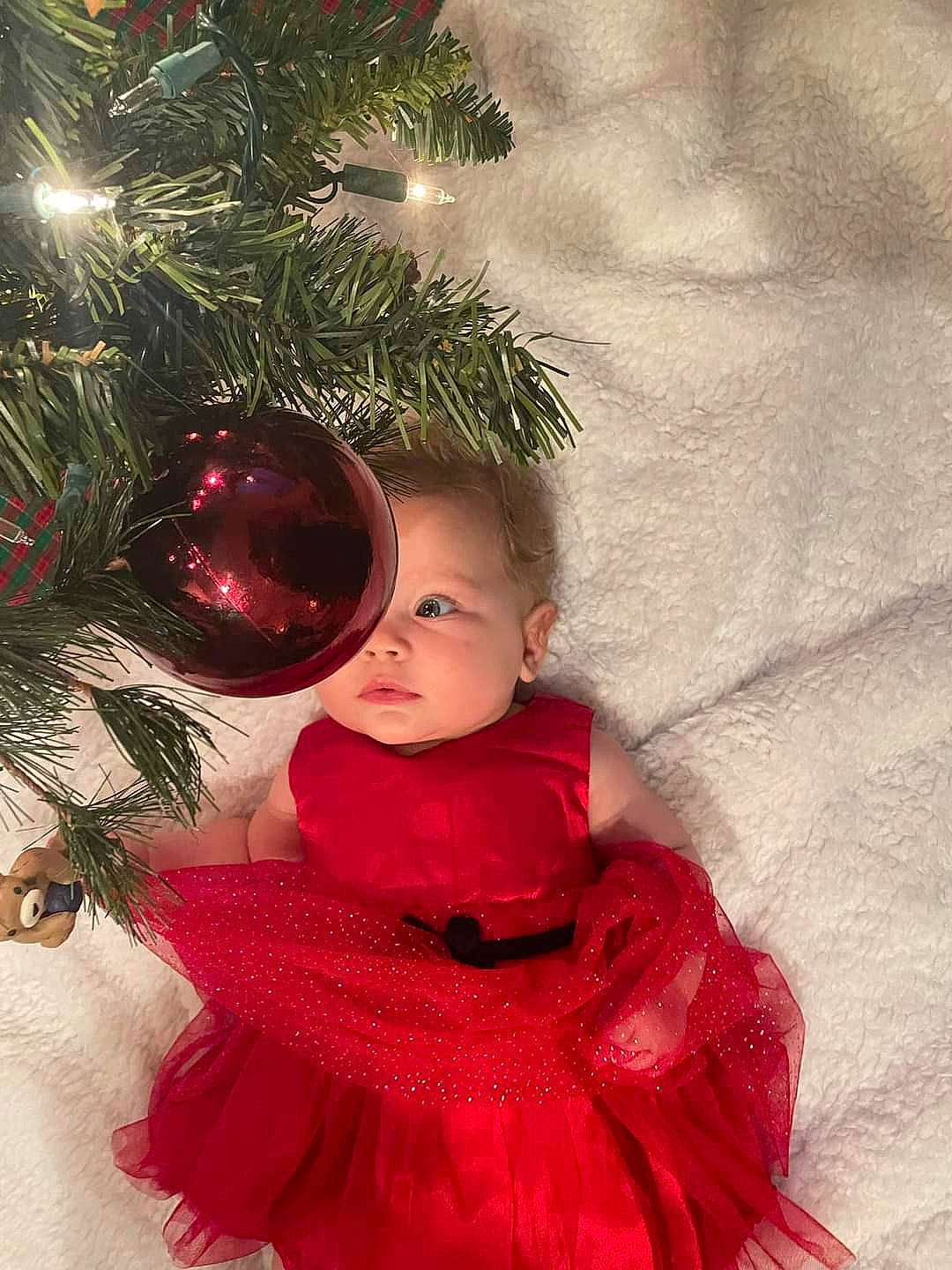 Oaklynn Mae joined the competition — help win amazing prizes! baby, baby_toddler_clothing, child, christmas, christmas_decoration, christmas_eve, christmas_ornament, christmas_tree, conifer, event, evergreen, happy, holiday, holiday_ornament, magenta, ornament, people_in_nature, person, sleeve, toddler
