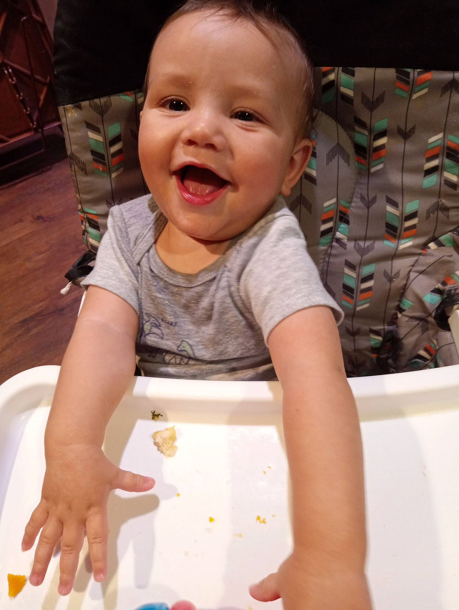 Zacheriah joined the competition — help win amazing prizes! baby, baby_toddler_clothing, cheek, child, finger, flooring, fun, happy, laugh, pattern, person, play, rectangle, sitting, skin, sleeve, smile, t_shirt, thumb, toddler