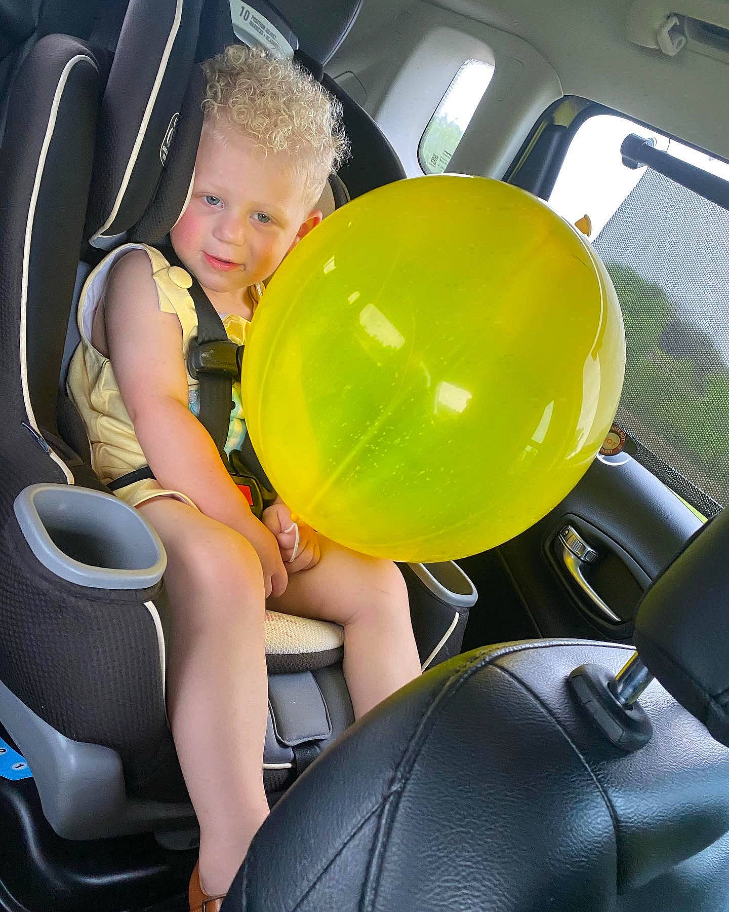 Kamdyn joined the competition — help win amazing prizes! arm, auto_part, automotive_design, balloon, chair, comfort, fun, happy, head, human_body, leisure, person, recreation, shorts, sitting, smile, t_shirt, thigh, toddler, toy