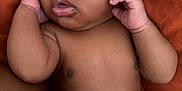 Dakari is registered to the contest to win money with this photo: baby, sleeping, infant, drool, skin, hand, face, curly_hair, blanket, comfort, rest, peaceful, closeup, newborn, soft, cushion, relaxation, portrait, child, indoors